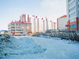 Обледеневший водоотводный канал в Чигирях угрожает подтоплением улицы Воронкова