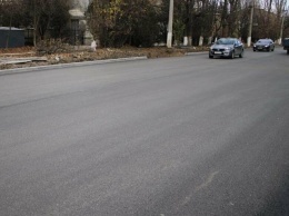 "А в чем прикол?": почему на улице Кечкеметской срезают недавно уложенный асфальт, - ФОТО, ВИДЕО