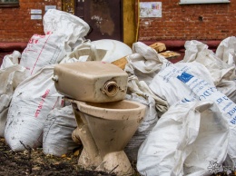 Суд наказал мариинские власти за свалку у мусорки