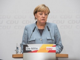 Меркель потребовала от Евросоюза найти "прямой контакт" с Путиным