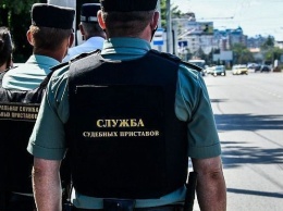 Дорожная пробка помогла приставам арестовать автомобиль должника в Краснодарском крае
