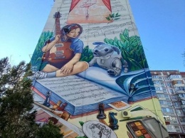 Огромное граффити на девятиэтажке в Краснодаре посвятили детям