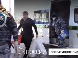 Передача собственника кемеровской "Зимней вишни" силовикам попала на видео