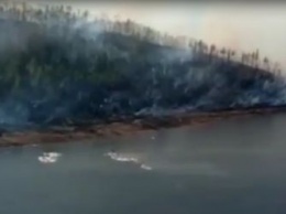 В Бекельдеульском заказнике на севере Приамурья второй день тушат природный пожар