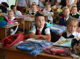 В Белгородской области «Металлоинвест» дарит всем первоклассникам Губкина школьные ранцы