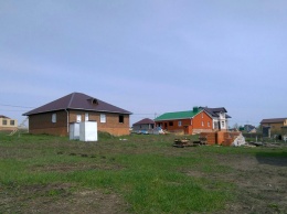 У белгородки арестовали земельный участок за долги по кредиту