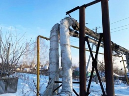 Повредивший трубу КамАЗ лишил тепла 11 домов и колонию в Кемерове