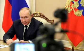 Путин выразил беспокойство о ситуации в Донбассе в разговоре с Меркель и Макроном