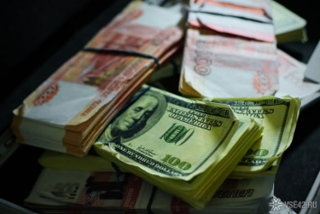 Аналитик посоветовал россиянам скупать доллары после президентских выборов в США