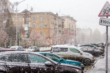 Аномальный снег из кузбасской дымки выпал в регионе